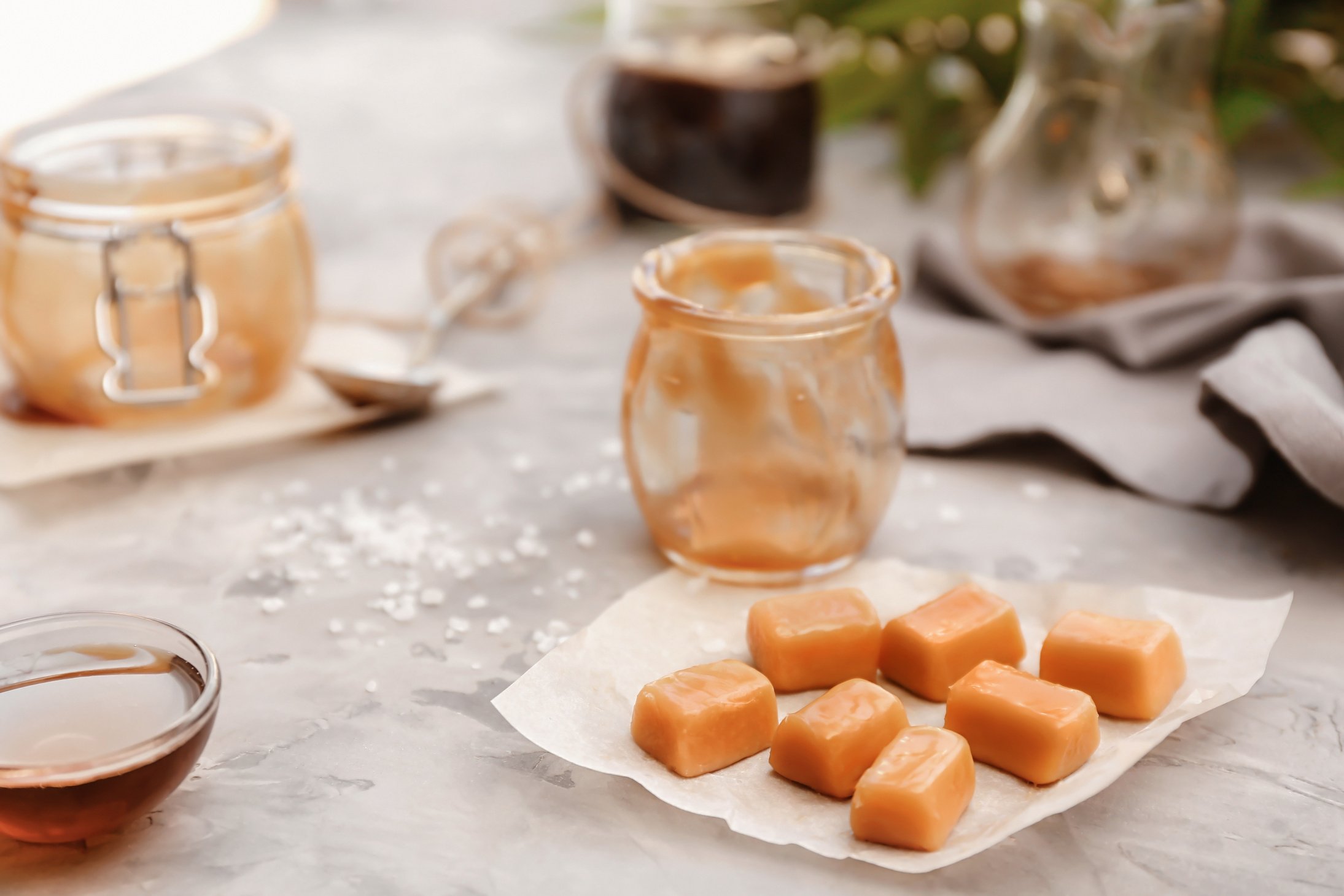 Tasty Caramel Candies on Table